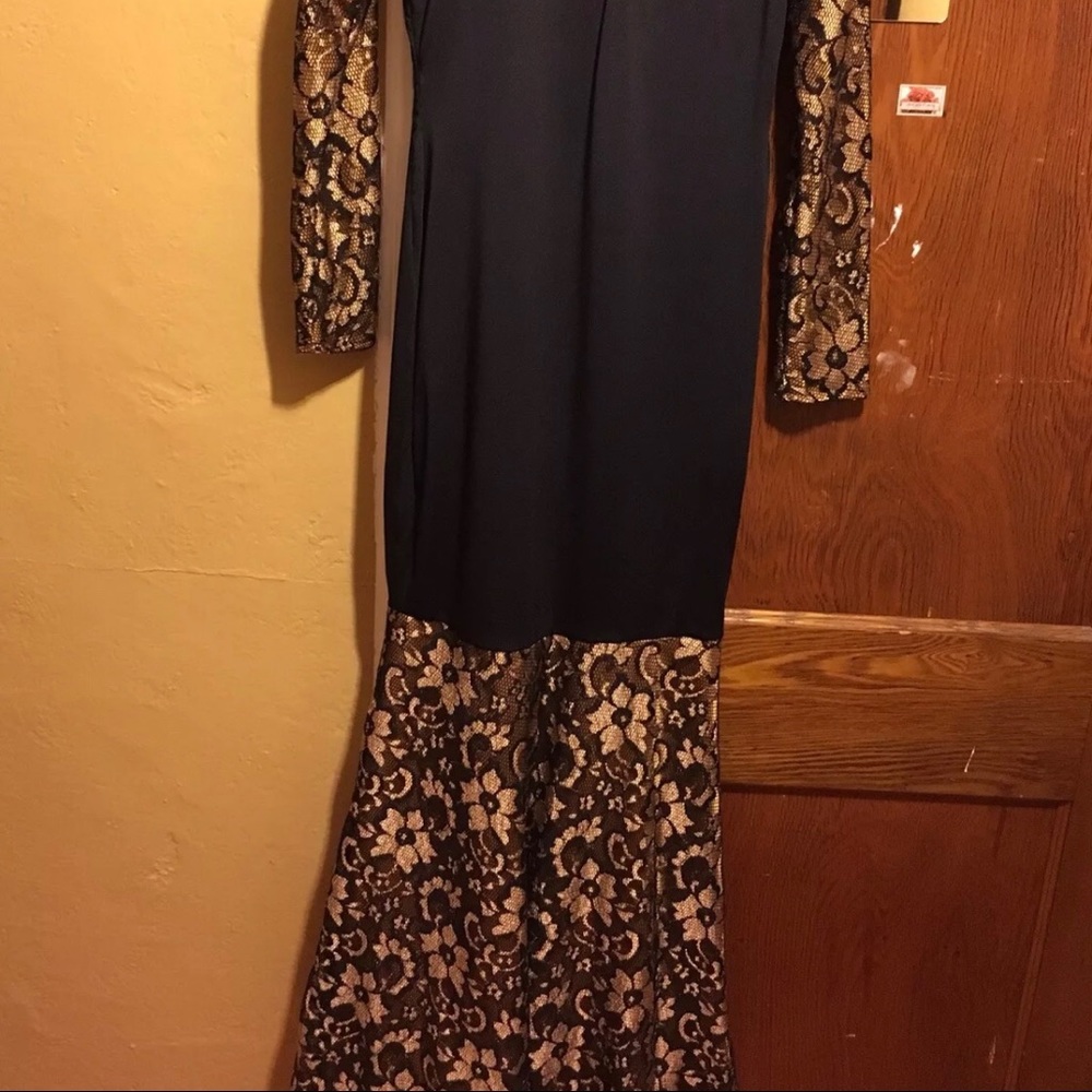 Long sleeved black and gold custom made dress